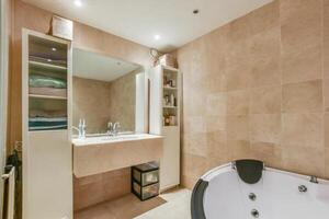 A bathroom with a tub and a sink photo