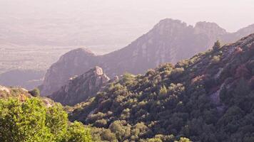 Majestic mountain range with trees in background video
