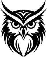 An owl head with a black and white design vector