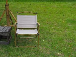 Camping chair on the lawn for a relaxing holiday photo