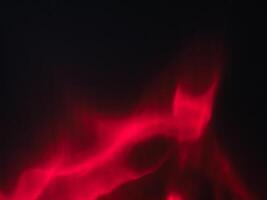 Red reflection in the dark for mysterious abstract background. photo