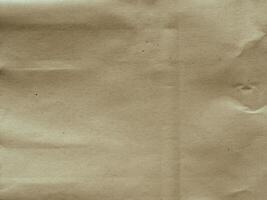 Old brown paper for vintage style background photo