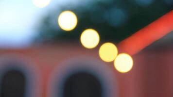 Night cafe lights, blurred image with bokeh and highlights, panoramic banner format photo