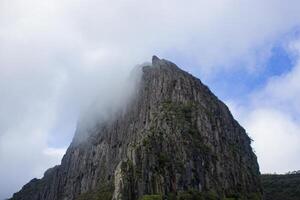 The Sumbing Cliff of Mount Kelud is a ridge consisting of dark gray andesite rock in a beautiful cone shape with a slope of almost 90 degrees. photo