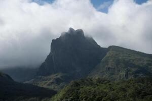 Beautiful view of Mount Kelud under the cloudy sky, one of the active volcanoes in East Java, Indonesia. photo