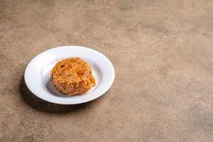 Perkedel Kentang is Potato croquette of ground meat and boiled potatoes or other starch, which then mash the potatoes together with garlic, salt, and pepper. photo