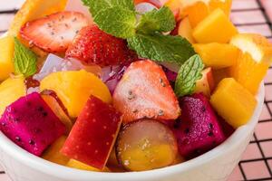Fruit salad is a dish consisting of various kinds of fruit. fruit salad can be served as an appetizer, a side salad, or a dessert. photo