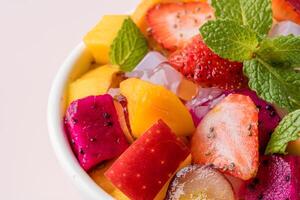 Fruit salad is a dish consisting of various kinds of fruit. fruit salad can be served as an appetizer, a side salad, or a dessert. photo