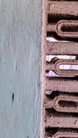 geometric pattern etched into a concrete surface photo