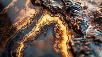 Bronzite stone showing its rich brown tones and reflective surfaces in a close-up shot. photo