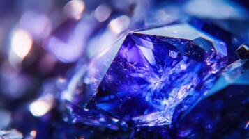 Vivid tanzanite close-up with bright blue and purple facets, smooth textures photo