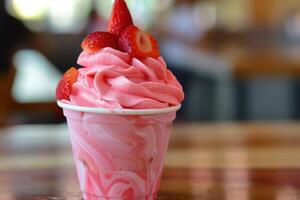 A Creamy and Refreshing Strawberry Yogurt Dessert Served in a Cup photo