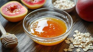 Homemade face mask applied for dry skin treatment on a wooden surface photo