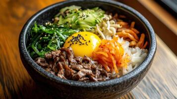 Tasty bibimbap with an assortment of toppings. photo