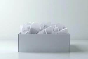 A stylish grey box filled with white paper crumples photo