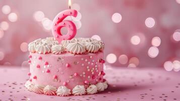 A Pink Birthday Cake With A Single Lit Candle Celebrates Six Years photo