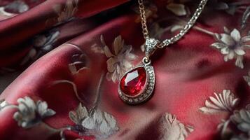 Ruby Pendant Showcased with Silk Elegance and Luxury photo