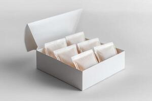 Elegant white box containing packaged items for gifting photo