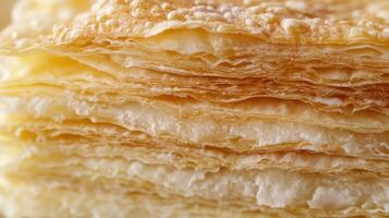 Detailed view of delicate flaky pastry layers. photo