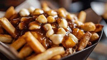 Close up of poutine, a classic Canadian dish. photo