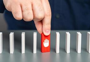 The man pauses in the process. Take a break. Make a stop to evaluate the results. Technical works. Make safety stops. Eliminates the delay and starts the process further. Check for errors. photo
