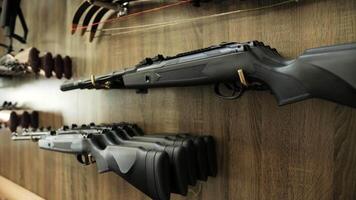 Assorted Air Rifles Displayed on Gun Rack in Store video