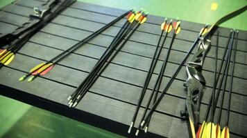 Arrows and Bows Displayed on Rack in Archery Range video