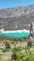 top view of a beautiful mountain lake of turquoise color. mountain landscape video