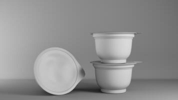3d rendering of a set of yogurt containers in gray studio background photo