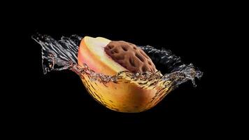 Looping rotation of half a peach with pit in splashing water. The peach slowly rotates 360 degrees. The file contains an Alpha Channel. video