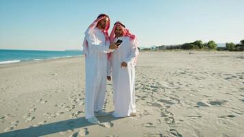 Sheik Unveiling A New Project To A Friend With A Smartphone video