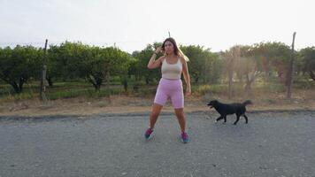 Woman Doing Side Steps Training With Dog video