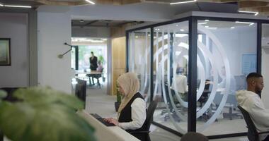 Group of business people brainstorming together in a startup space, discussing business projects, investments, and solving challenges. video