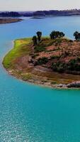 Peaceful lake island scene is progressively becoming glitched and distorted, transforming into a colorful abstract composition video