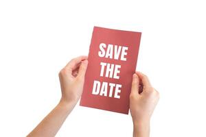 Save the date message written on red page with white background. Conceptual save the date symbol. Copy space. photo