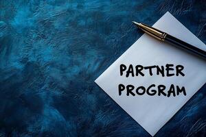 Partner program on paper with pen photo