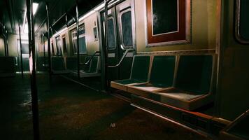 An empty subway car in a dimly lit metro station video