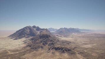 An aerial view of a mountain range in the desert video