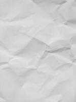 White recycled craft paper texture as background. Grey paper texture, Old vintage page or grunge vignette of old newspaper. Pattern rough art creased grunge letter. Hardboard with copy space for text. photo