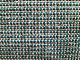 Rough texture macro green and white woven fabric. abstract background photo
