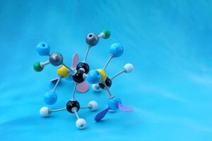 Simulate Shape of covalent molecules on a blue background. Soft and selective focus. photo
