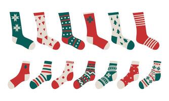 Flat design colorful socks set illustration. Christmas winter socks set red, white and red color for winter and Christmas design . vector