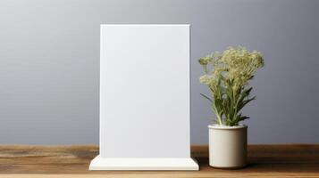 Mockup of a vertical sheet of paper in a vase on a wooden table photo