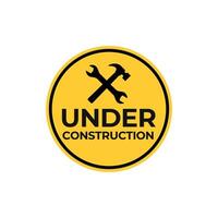 Under construction sign with hammer and wrench vector