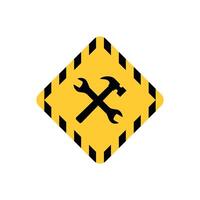 A yellow and black warning sign with a hammer and wrench vector