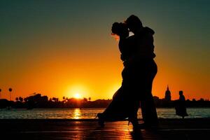 Dramatic silhouette of tango dancers against the setting sun at festival, the city's iconic architecture faintly visible in the background photo