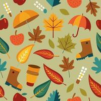 Autumn leaves and boots pattern with an umbrella and apple vector