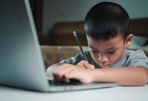 Technology studying at home using laptop computer, Student distance learning virtual distance online class on call virtual lesson, Parent or tutor teaching child boy with remote education. photo