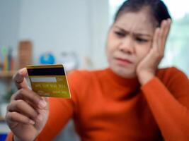 Online banking transaction concept, Woman is dismissal with credit card, Using smartphone shopping online, E Commerce and secure mobile banking concept, Making online payments. photo