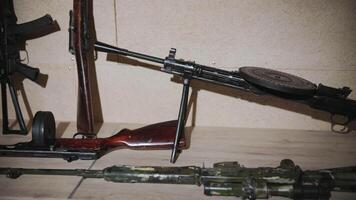Machine Gun with Drum Magazine Displayed on a Stand video